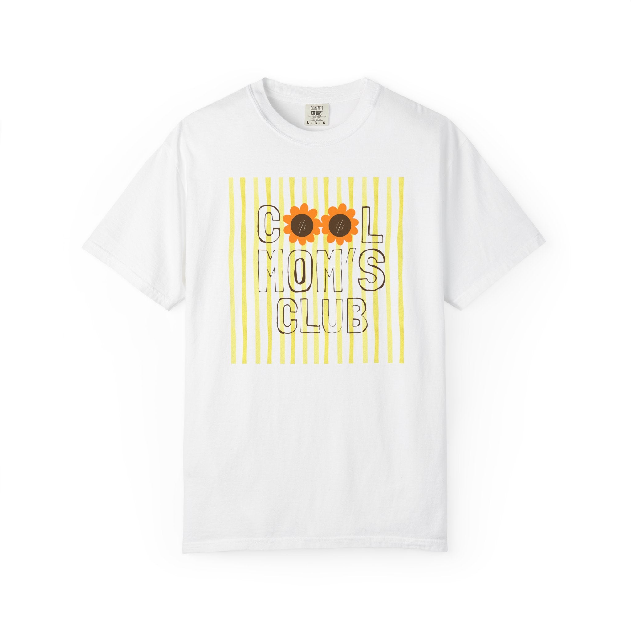 A white short-sleeve crewneck t-shirt featuring a graphic print on the front with yellow vertical stripes, the text 'COOL MOM'S CLUB' in black outline letters, and two sunflower graphics replacing the 'O's.