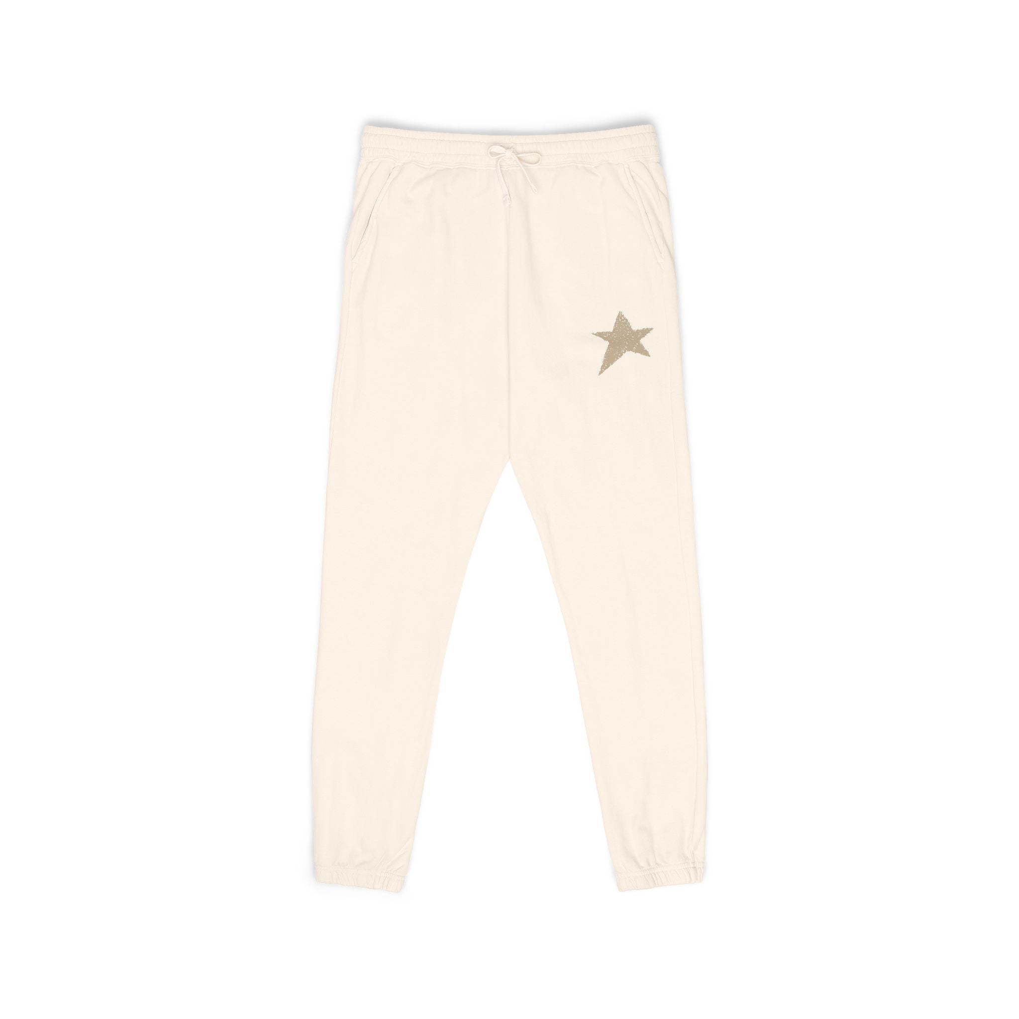 Cream-colored jogger pants with a small gold star embroidered on the left hip, shown against a plain white background.
