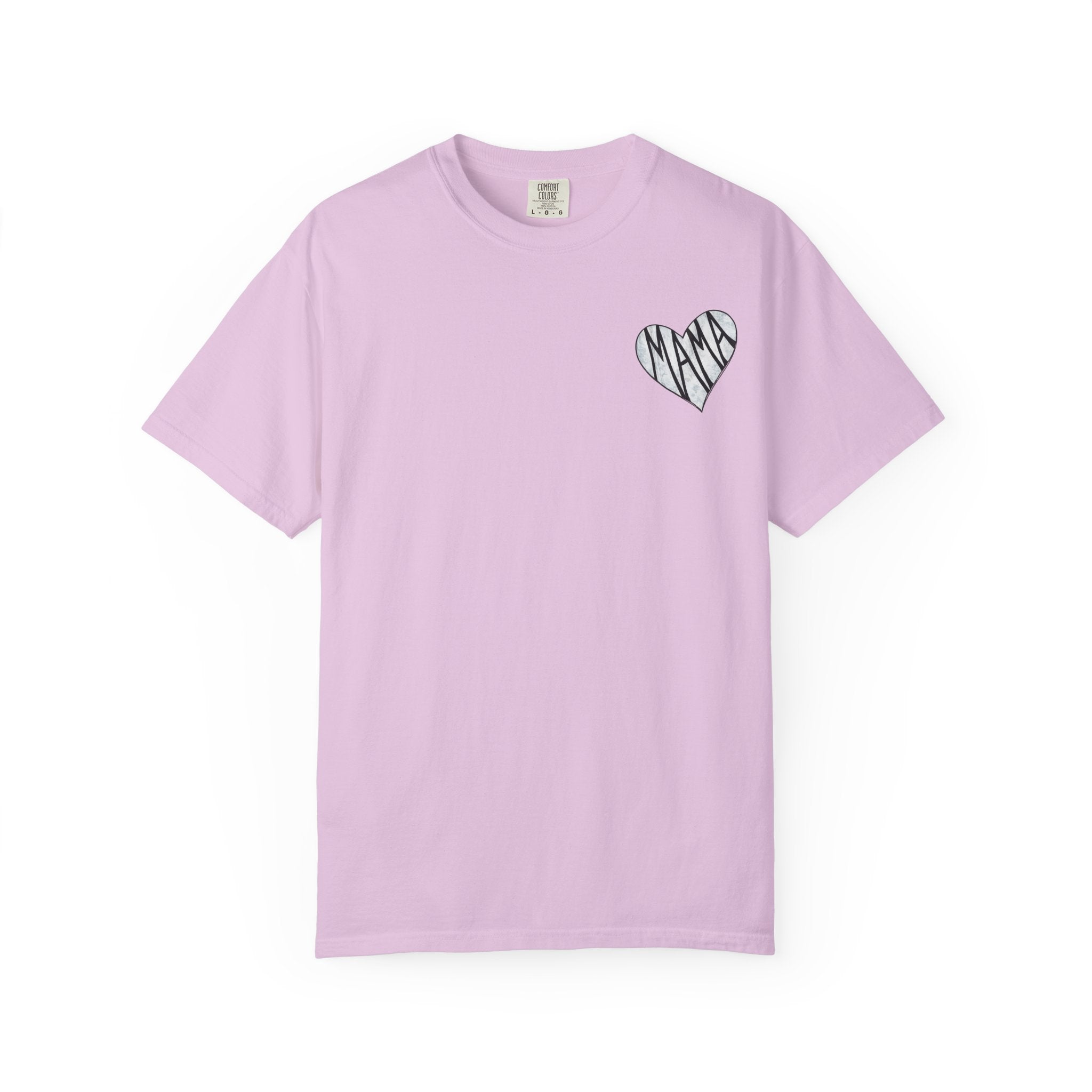 A light pink short-sleeve crewneck t-shirt with a small black heart graphic on the left chest containing the word 'MAMA' in a scribbled font, displayed on a clean white background.