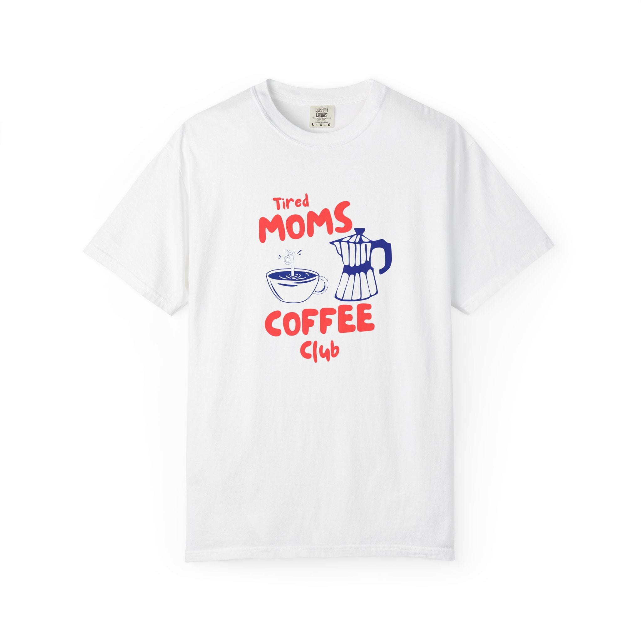 A white short-sleeve crewneck t-shirt featuring a graphic print on the front with the text 'Tired Moms Coffee Club' in red and blue, accompanied by illustrations of a coffee cup and a moka pot.