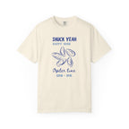 Beige t-shirt with blue graphic and text on a white background