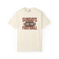 An off-white short-sleeve crewneck t-shirt with a graphic on the front that reads 'SUNDAYS ARE FOR FOOTBALL' in brown, featuring a football illustration in the center.