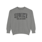 A gray crewneck sweatshirt with 'SPOOKY SEASON' printed across the chest in a distressed black-and-white patterned font, shown on a plain white background.