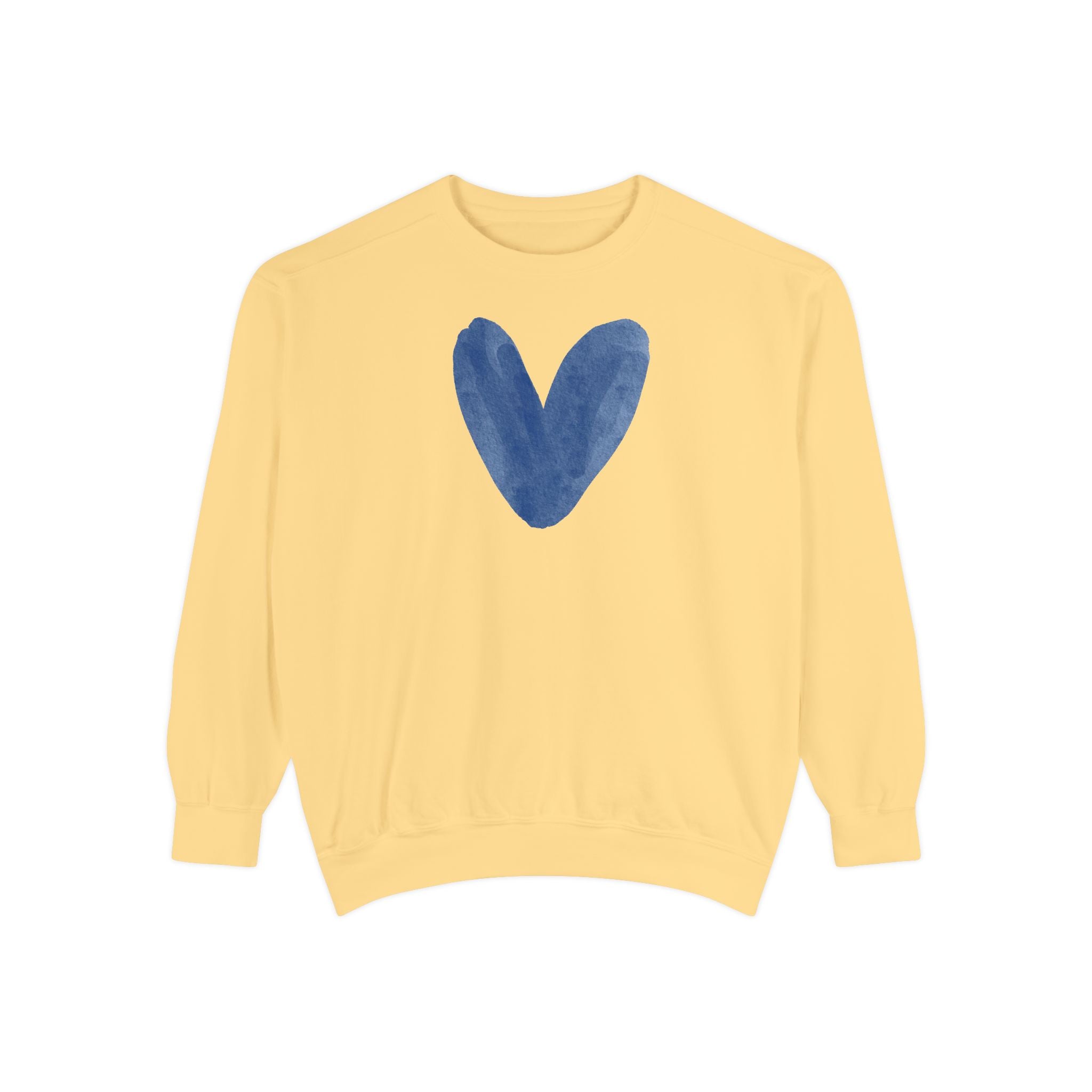 A pale yellow crewneck sweatshirt featuring a textured blue heart graphic printed on the center chest, displayed against a solid white background.