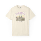 Beige t-shirt with 'Barcelona, Spain' and Sagrada Familia graphic on a white background