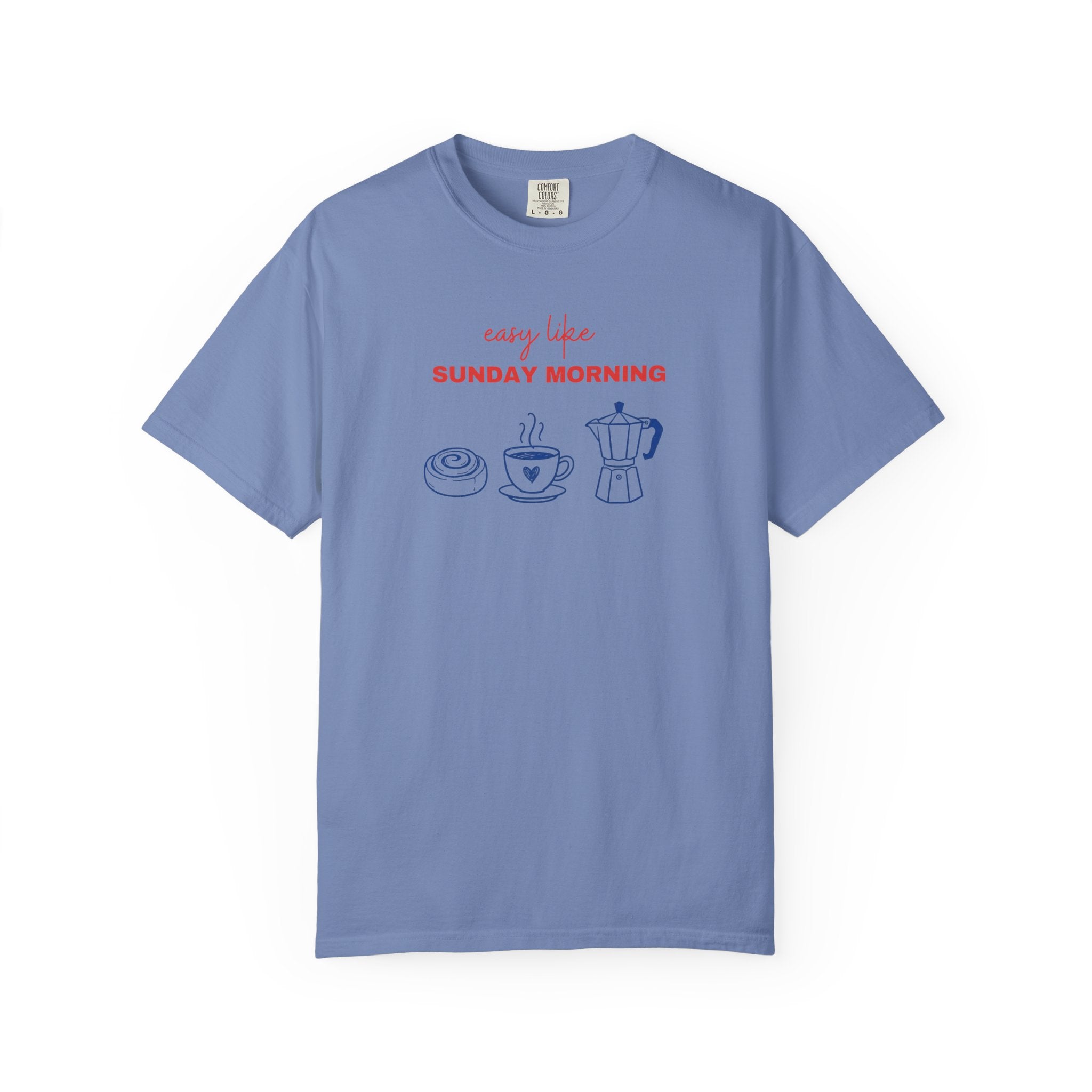 Teal t-shirt with 'movement is human' text and abstract design on a white background