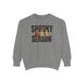 A gray crewneck sweatshirt featuring a 'Spooky Season' graphic on the chest with three cartoon ghosts wearing orange and black plaid, leopard print, and green plaid hats.