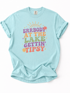 Light blue t-shirt with colorful text design on a white background