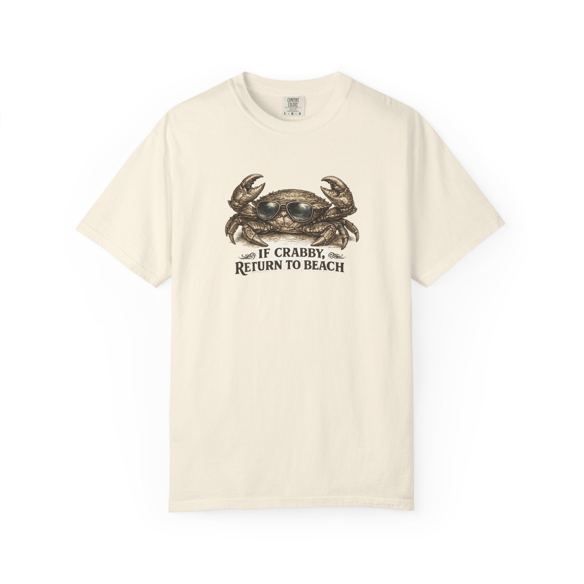 An off-white short-sleeve crewneck t-shirt featuring a graphic of a crab and the text 'IF CRABBY, RETURN TO BEACH' printed on the chest.
