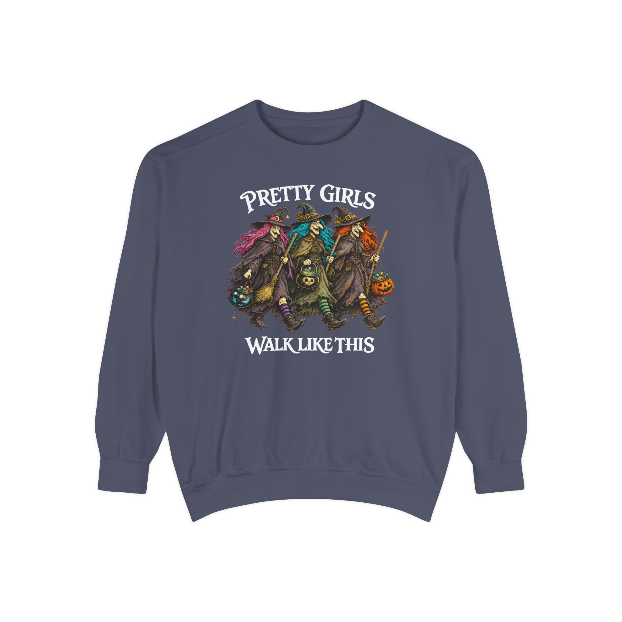 A slate blue crewneck sweatshirt featuring a graphic of three stylized girls dressed as witches with pumpkins, with the text 'PRETTY GIRLS WALK LIKE THIS' printed on the front.