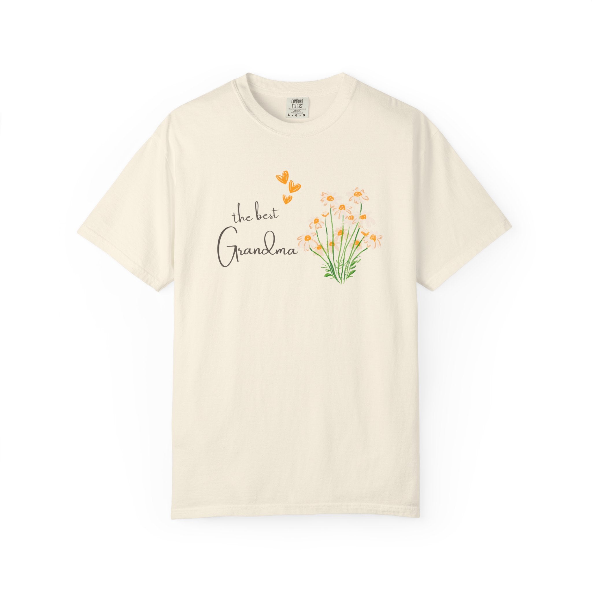 Beige t-shirt with 'the best Grandma' text and floral design on a white background