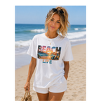 Woman wearing a 'Beach Life' t-shirt on a beach
