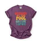 Purple t-shirt with colorful text on a white background