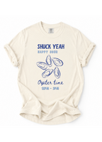 Beige t-shirt with blue graphic and text on a white background