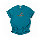 Blue t-shirt with a graphic design on a white background
