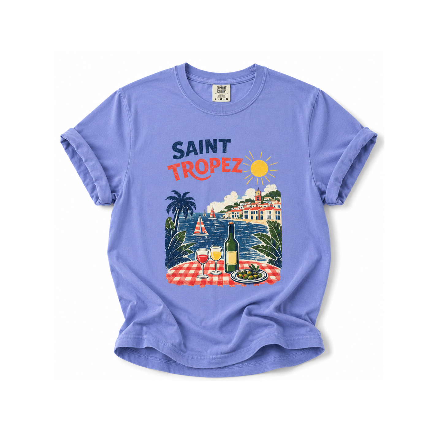 Purple t-shirt with 'Saint Tropez' design featuring a beach scene on a white background