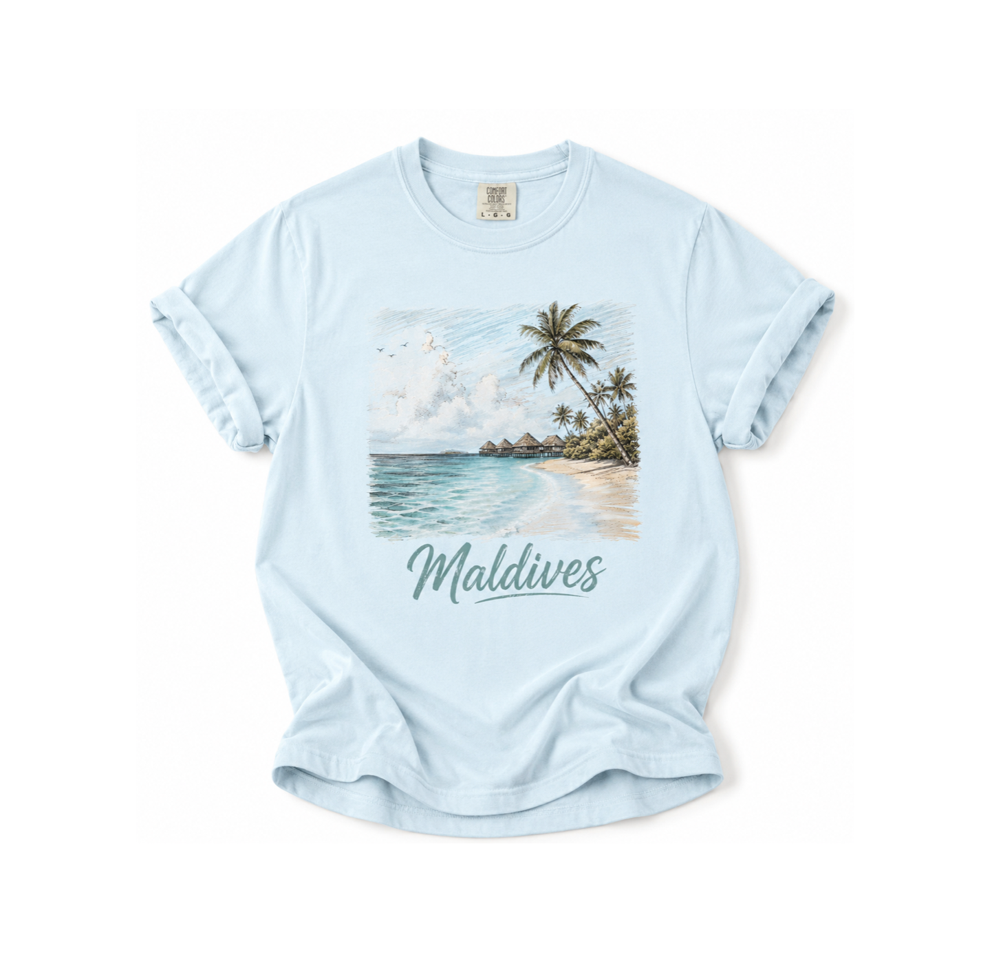 Light blue t-shirt with a tropical beach graphic and 'Maldives' text on a white background
