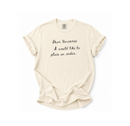 Beige t-shirt with text 'Dear Universe I would like to place an order' on a white background