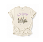 Beige t-shirt with 'Barcelona, Spain' graphic on a white background