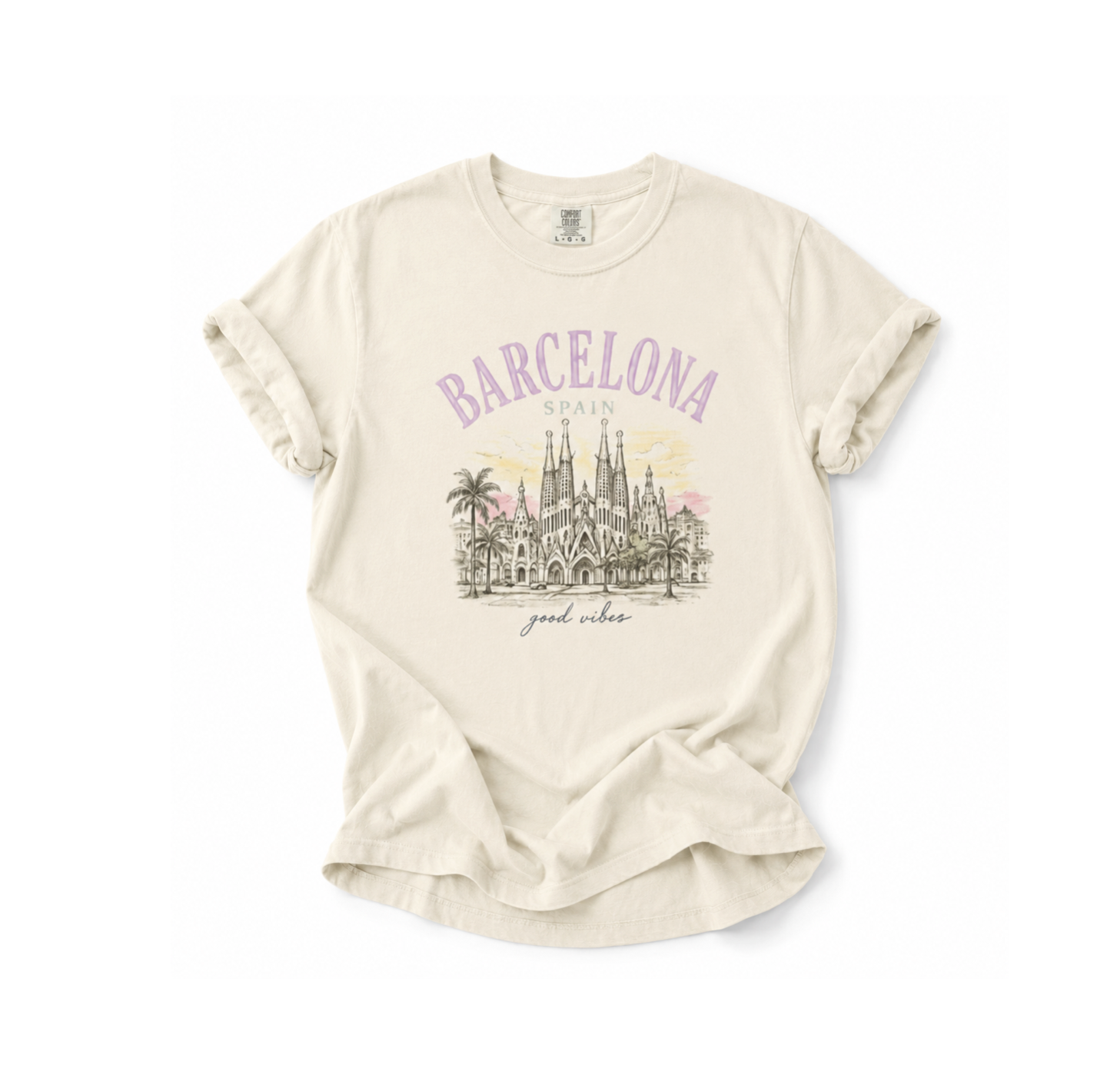 Beige t-shirt with 'Barcelona, Spain' graphic on a white background