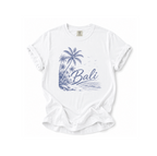 White t-shirt with blue palm tree design and 'Bali' text on a white background