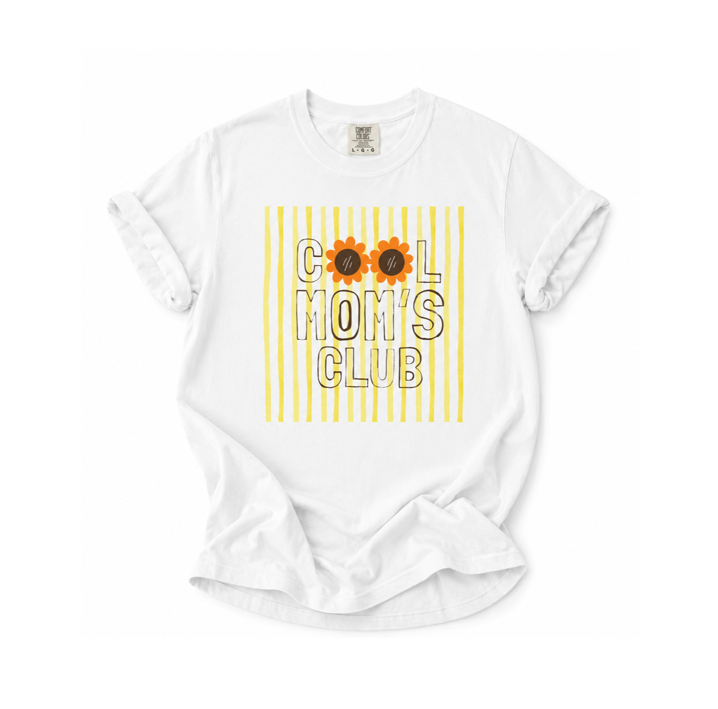 A white short-sleeve t-shirt with a graphic print reading 'COOL MOM'S CLUB' in black outlined letters over yellow vertical stripes, with two sunflower graphics replacing the O's. The shirt is laid flat on a white background.