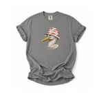 A gray short-sleeve t-shirt with a graphic of a white pelican wearing a red and white patterned bucket hat, displayed flat against a white background.